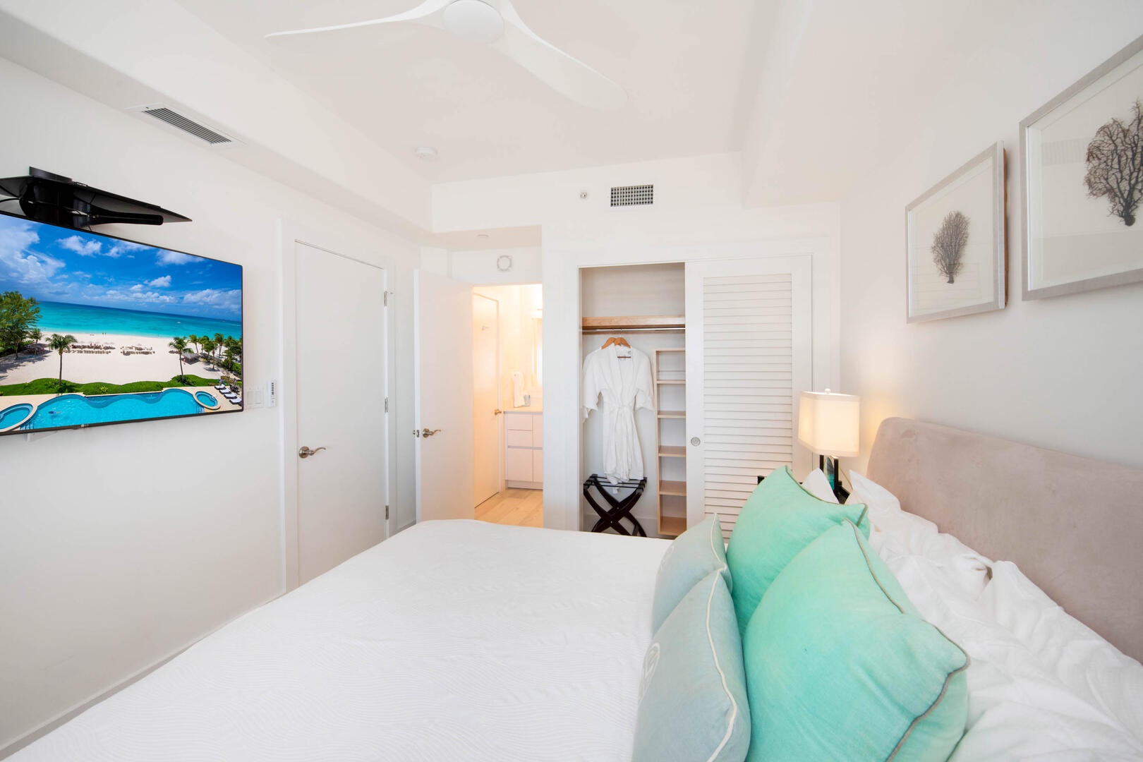 Guest Suite #1 furnished with king bed and television.