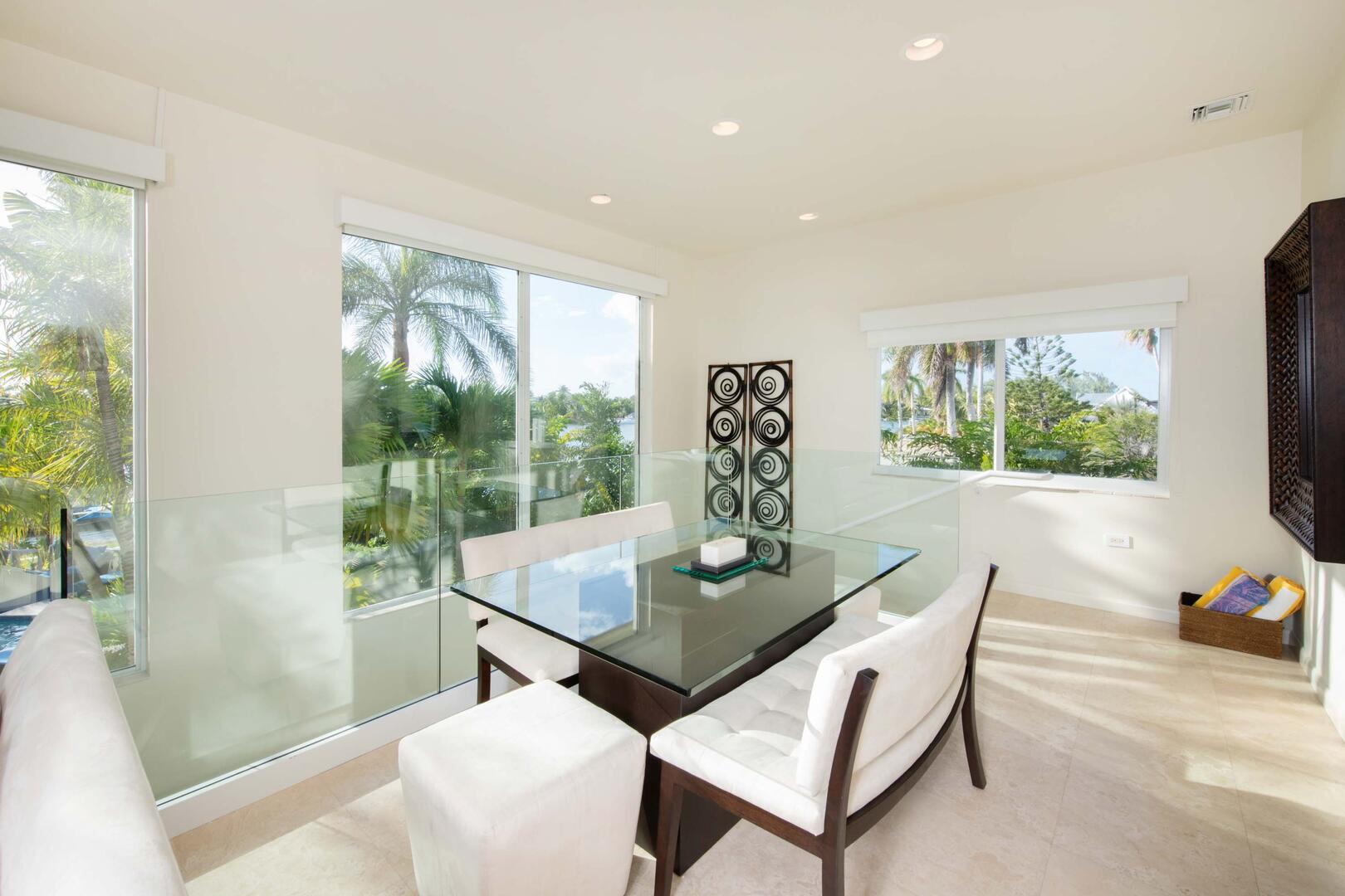 Dining area with seating for 4 guests.