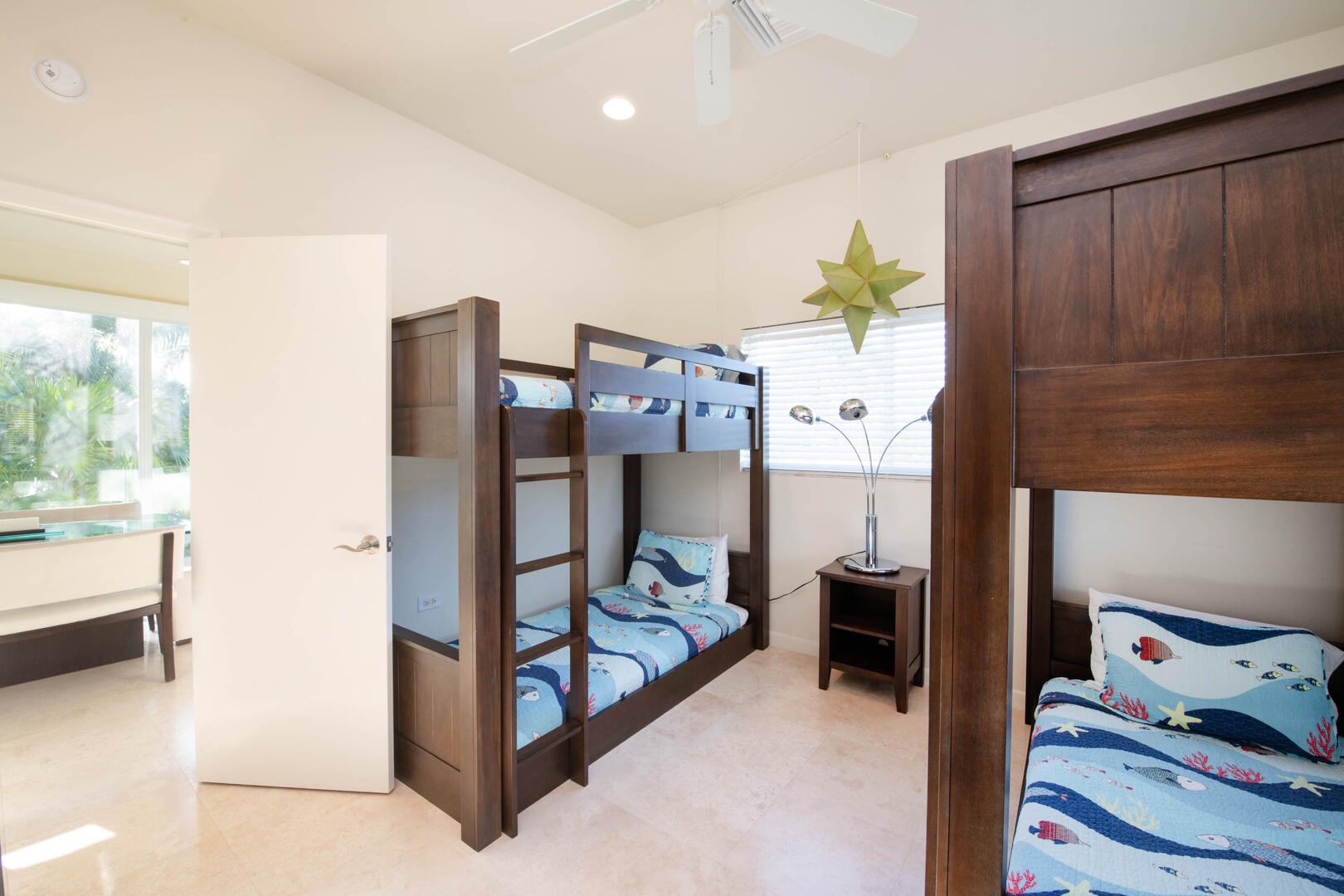 Bunk suite with four twin-over-twin bunk beds. Sleeps 4 children or 2 adults.
