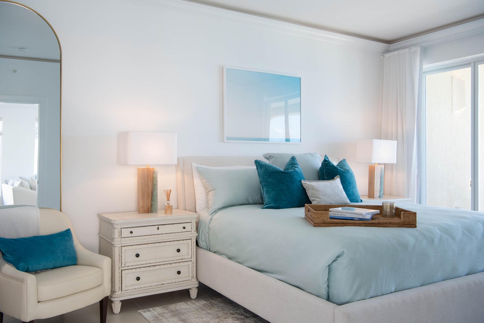 Oceanfront master suite with walk-out access to balcony.