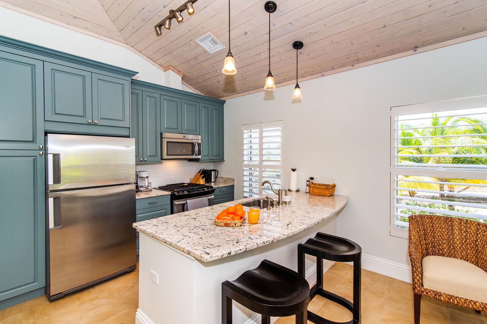 Full kitchen with modern appliances.