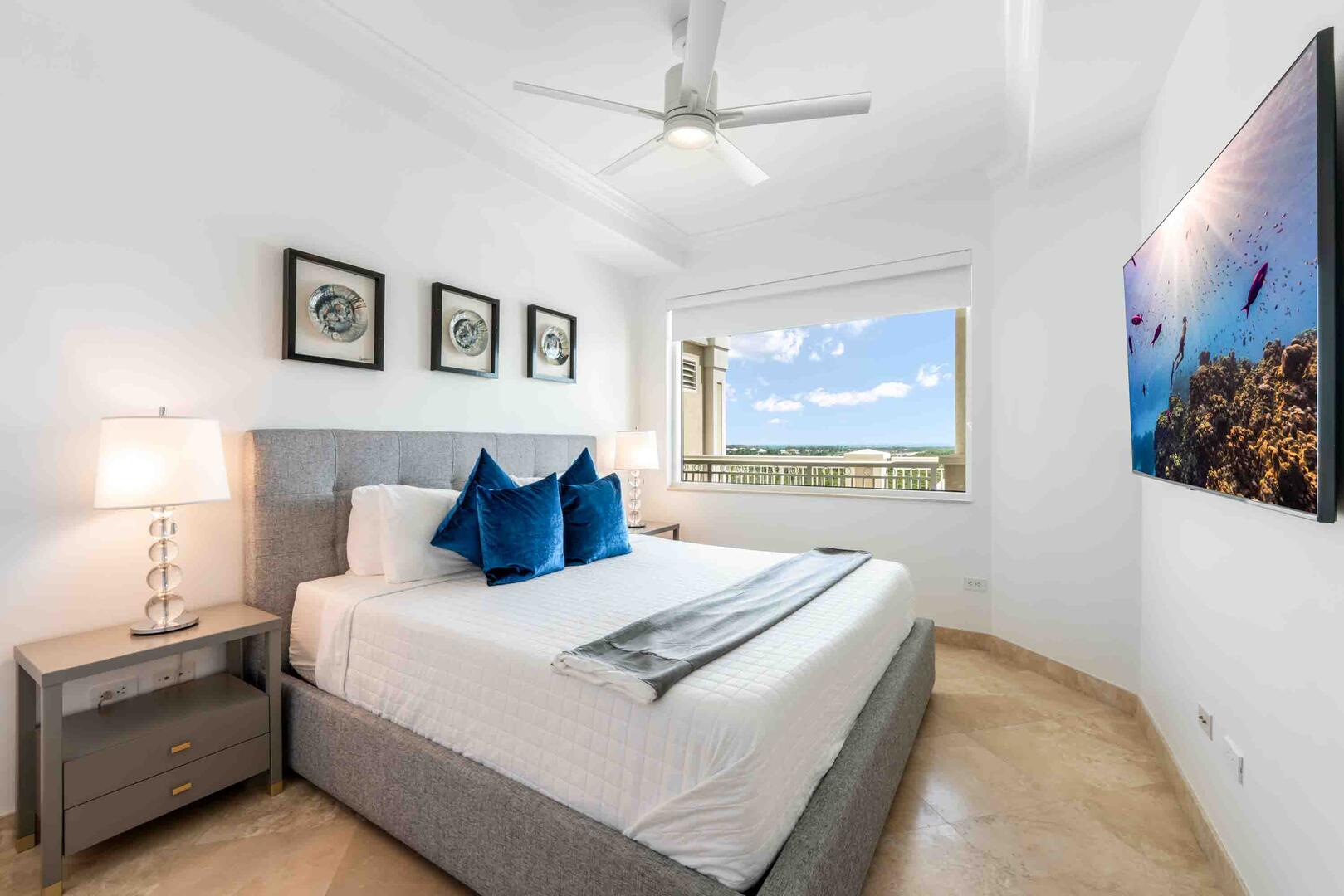 Guest Suite 1 with king bed and HD cable television.