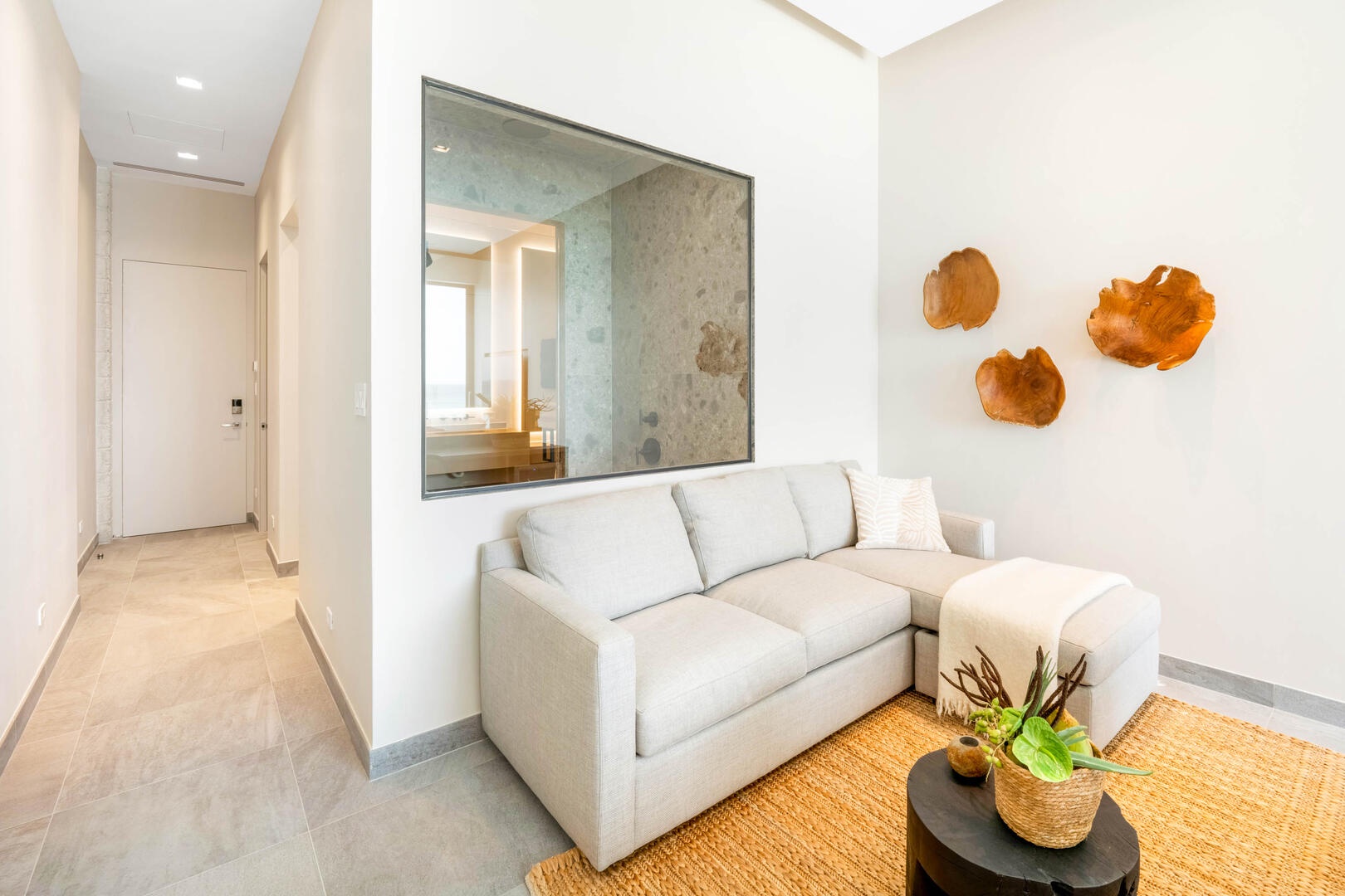 Oceanfront king suite 3 - king platform bed, desk, oceanfront floor-to-ceiling glass doors, 65" TV w/swivel mount, beverage fridge, coffee center, upholstered chair, sofa