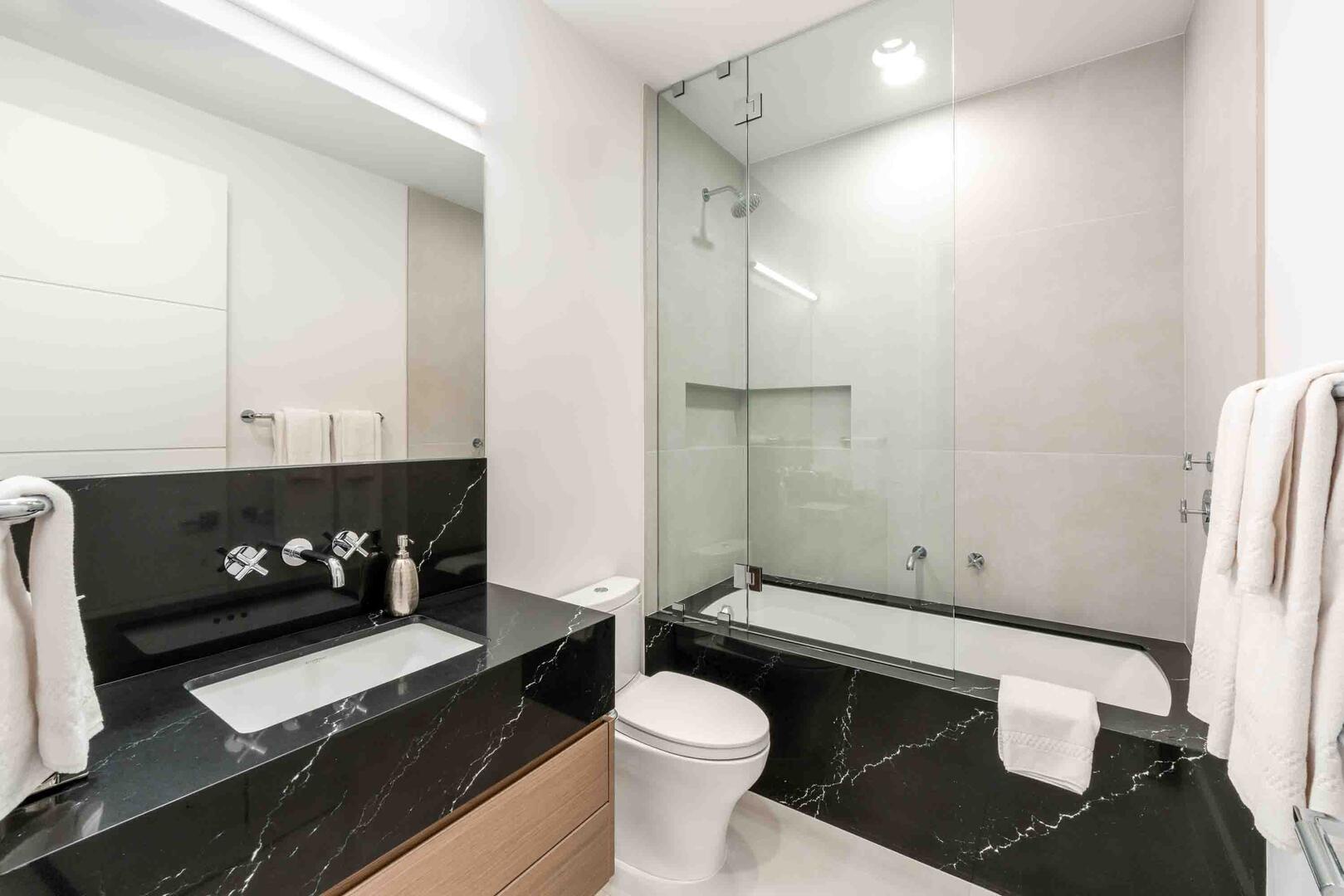 Bedroom 4 ensuite with shower bath.