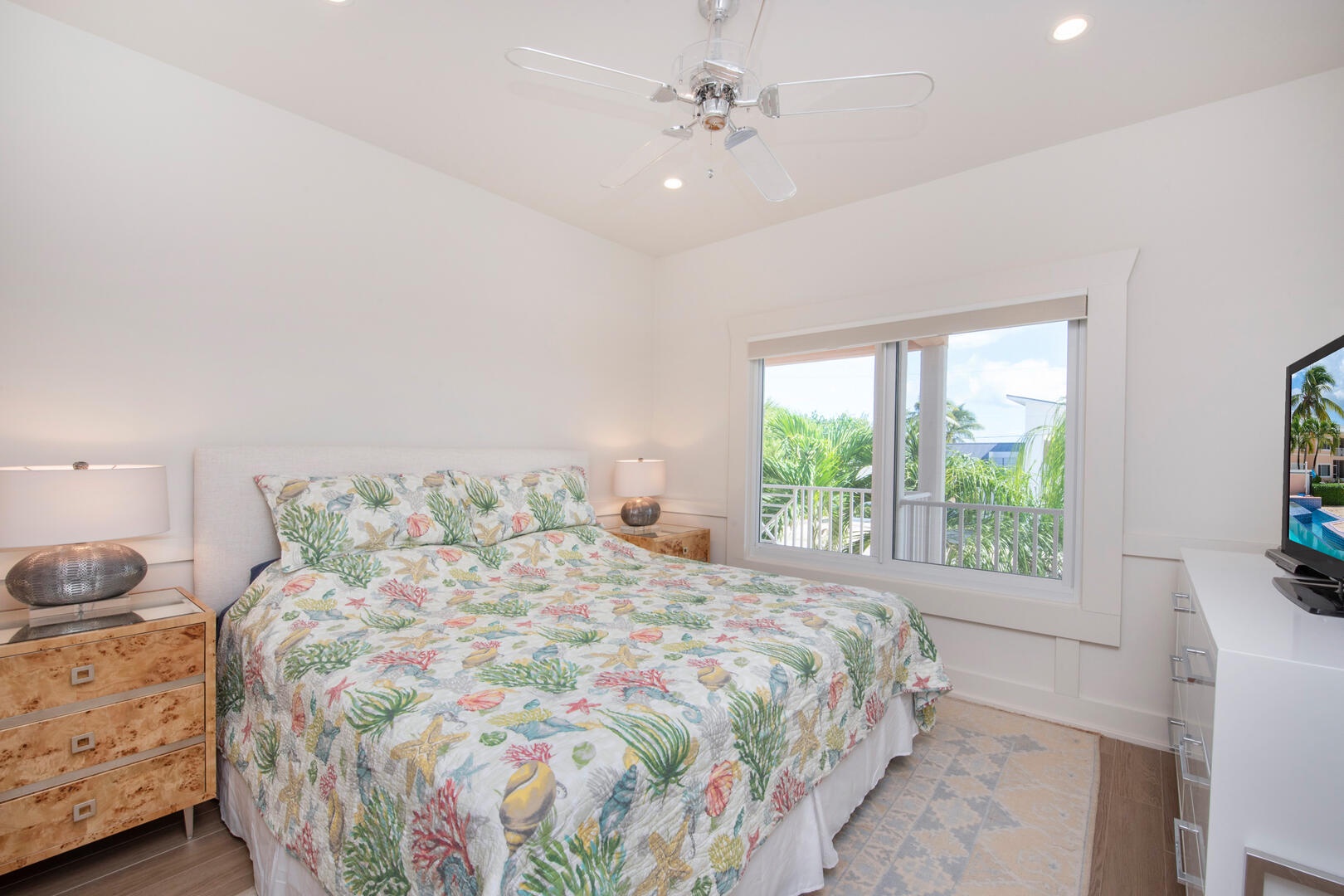 The Guest Suite comes furnished with a king bed, dresser, and night stands.