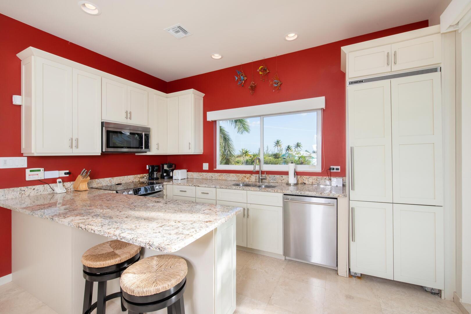 Full kitchen with modern appliances.
