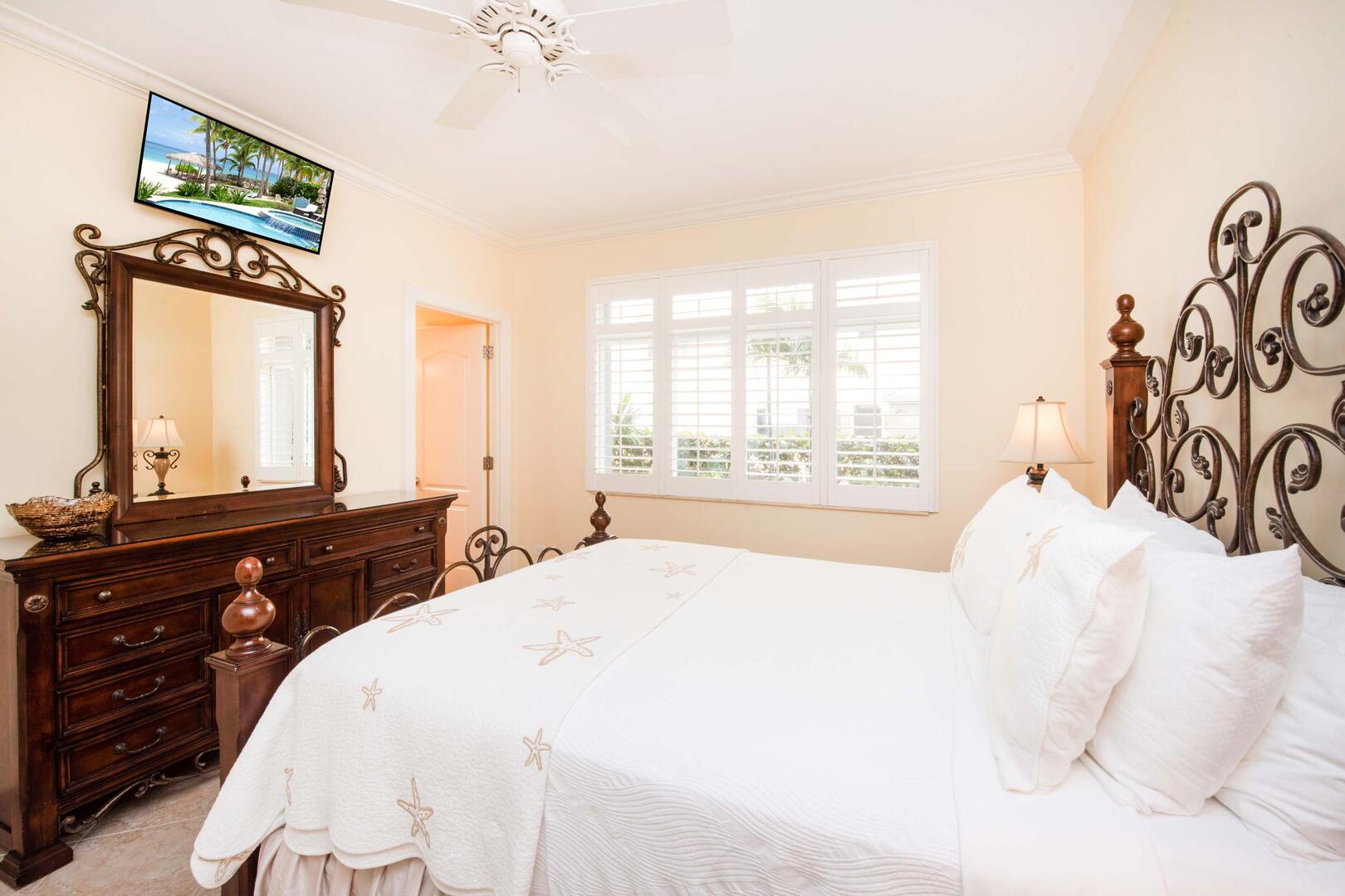 Bedroom 3 with queen bed and HD cable TV.