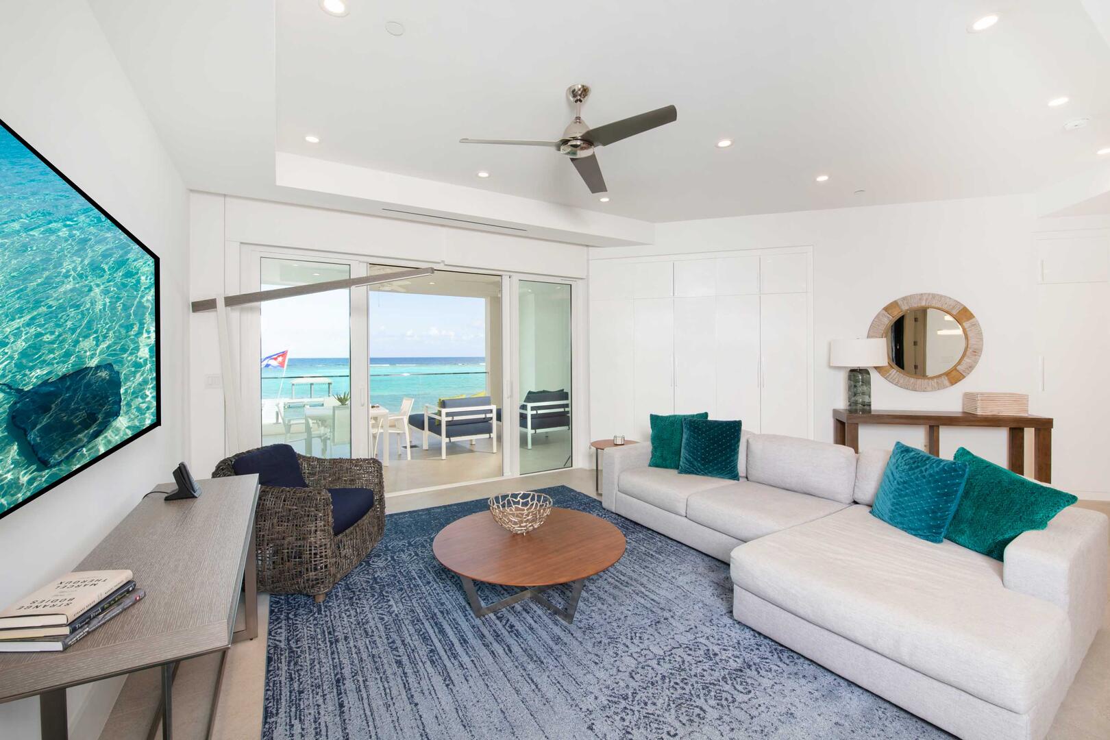 Furnished living area with modern decor and SmartTV.