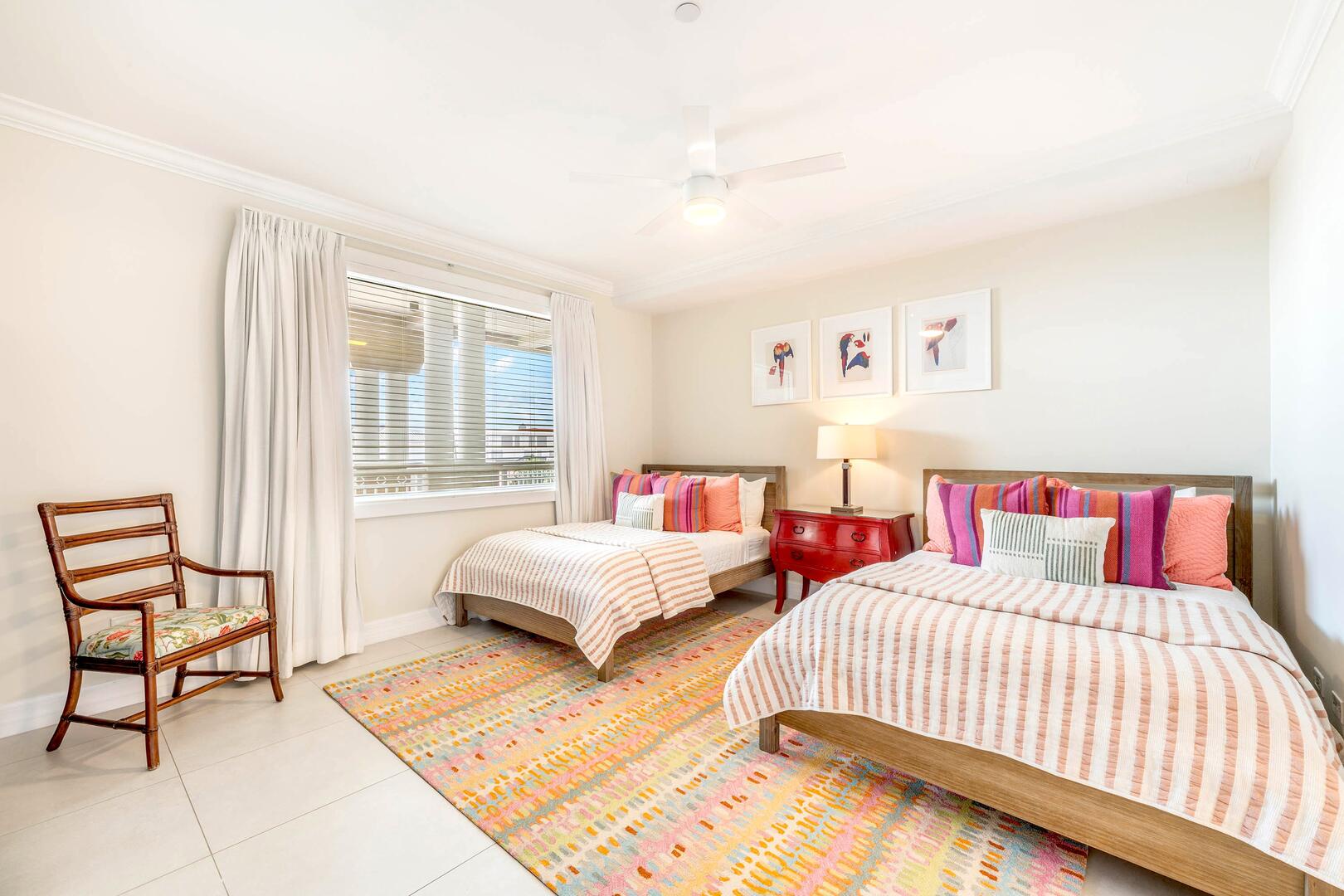 Bedroom 4 furnished with two double beds. All bedding and linens are provided for your comfort.