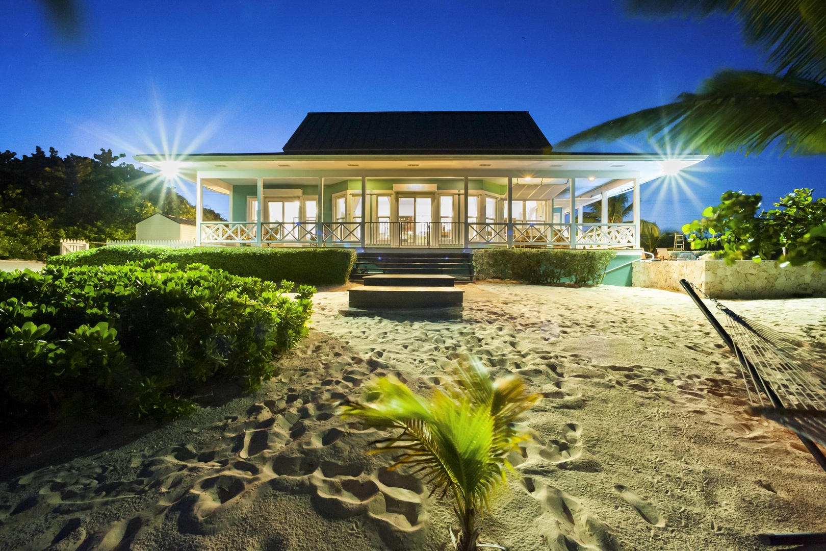 Exterior of Lone Palm at dusk.