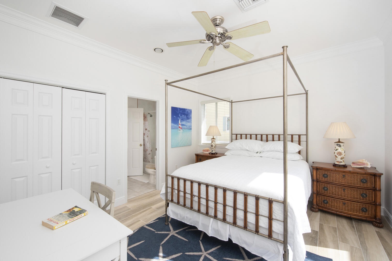 Bedroom 3 is also furnished with a desk and chair.