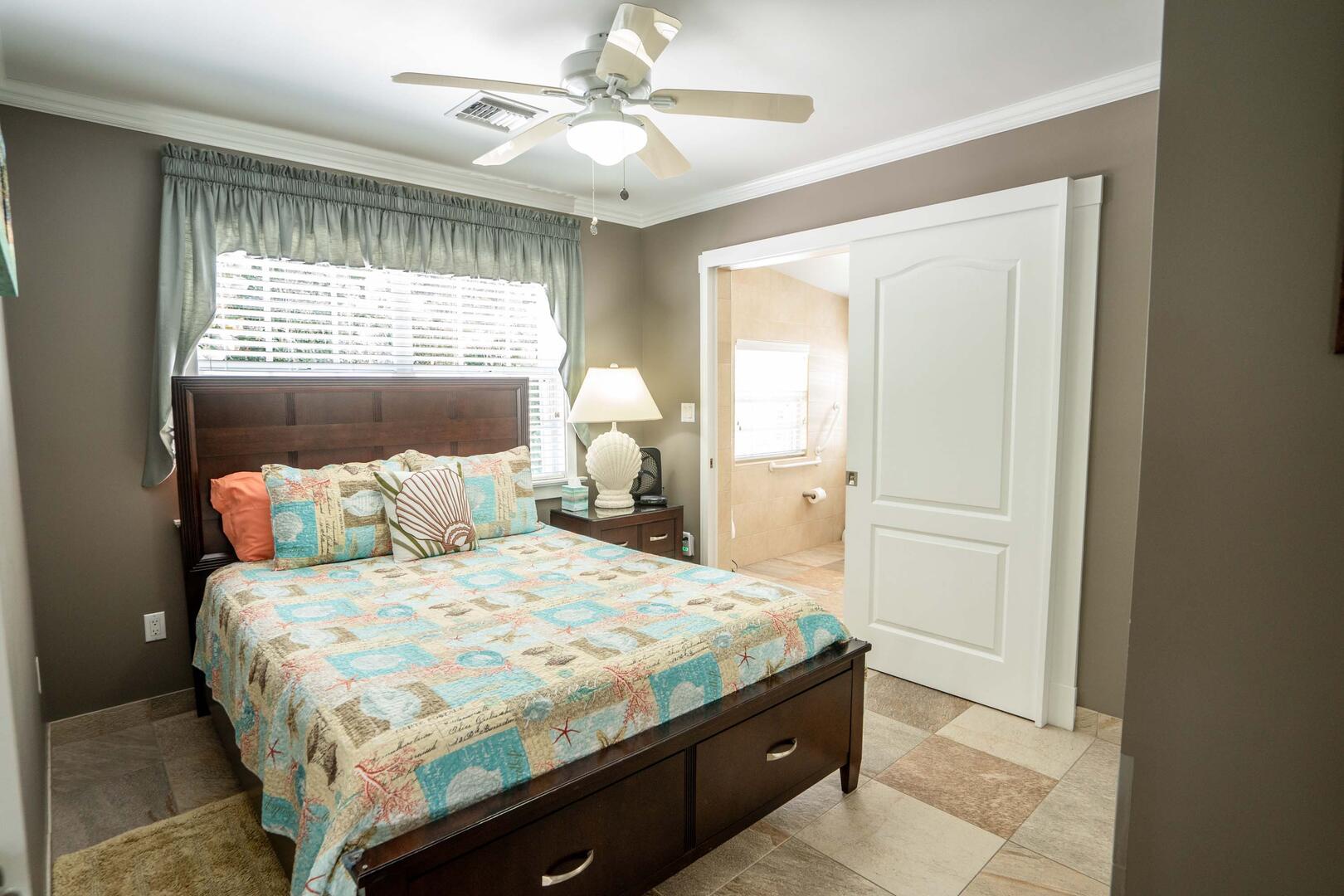 Primary suite with queen bed and ensuite.