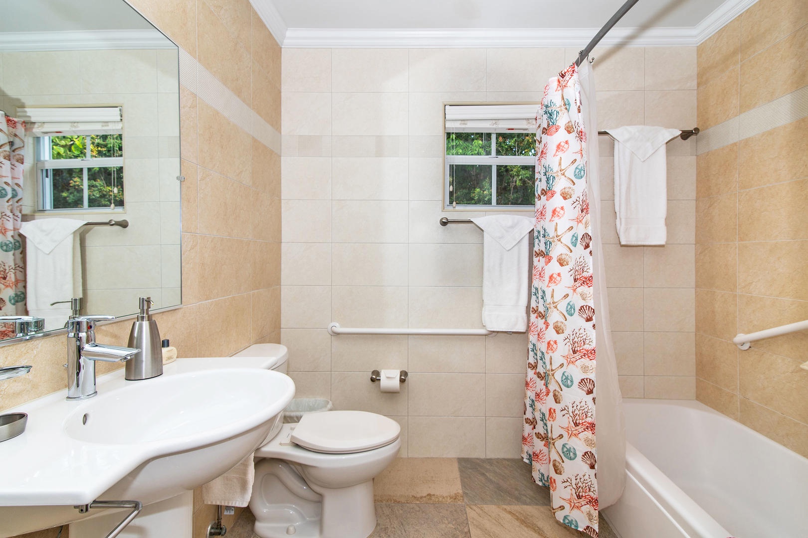 Hall bathroom off the living area equipped with a shower bath.