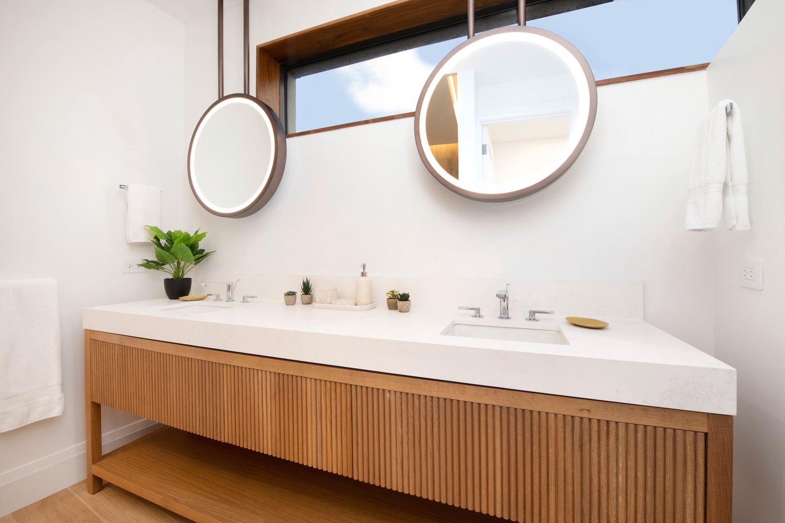 Bedroom 1 ensuite with double vanity.