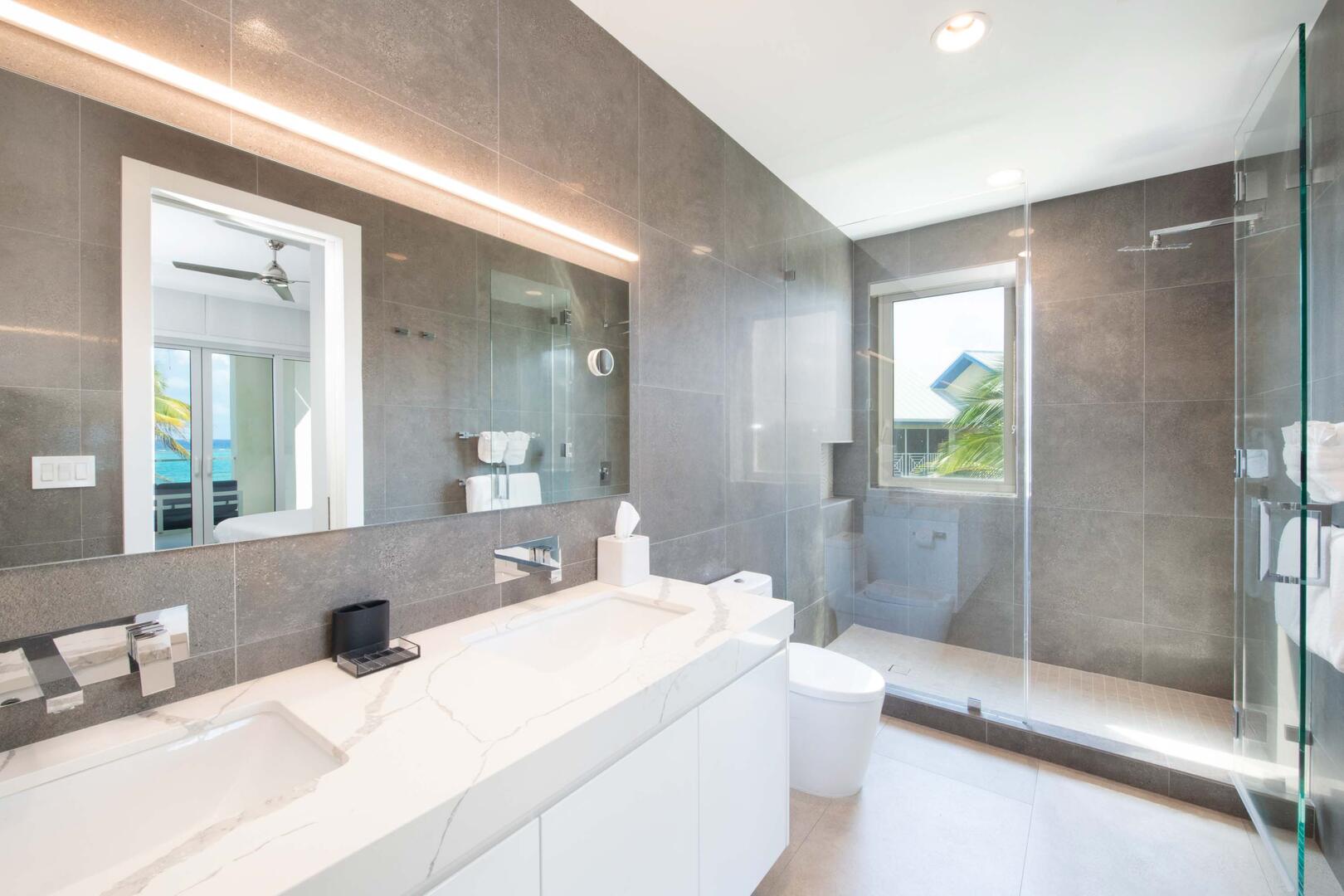 Primary Ensuite #2 with dual vanity and walk-in shower.