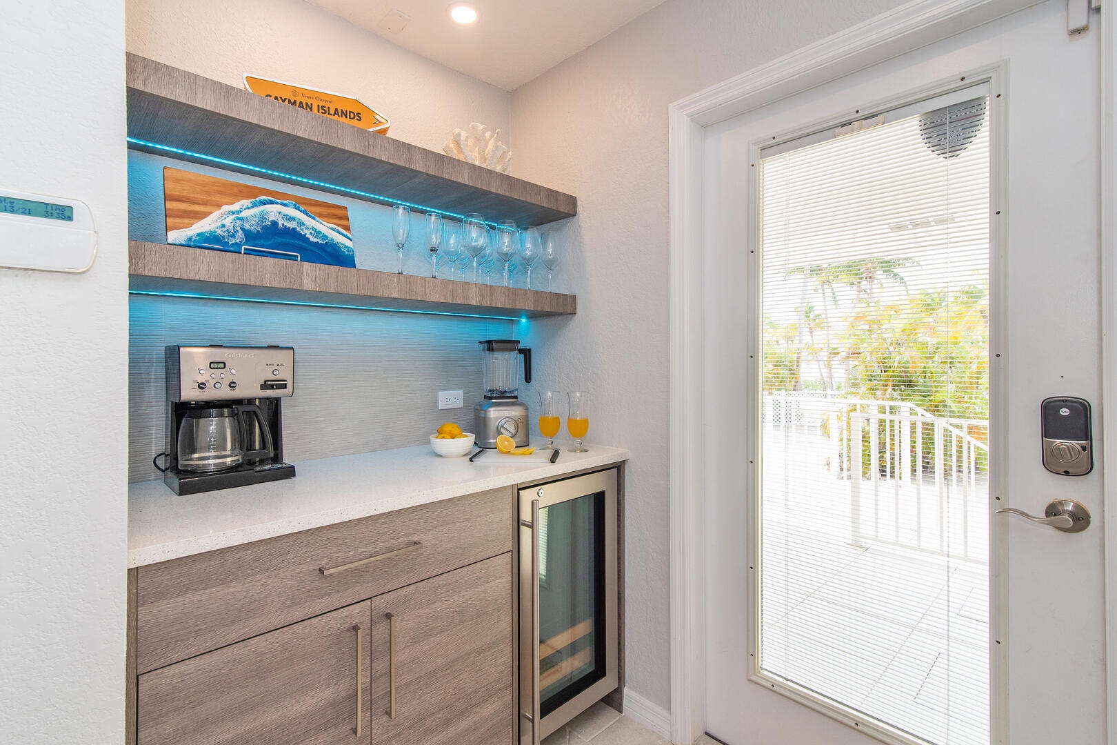 Wet bar with coffee machine and blender.