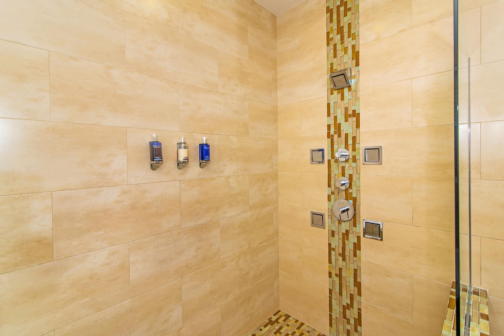 Master bath with a soaking tub and walk-in shower.