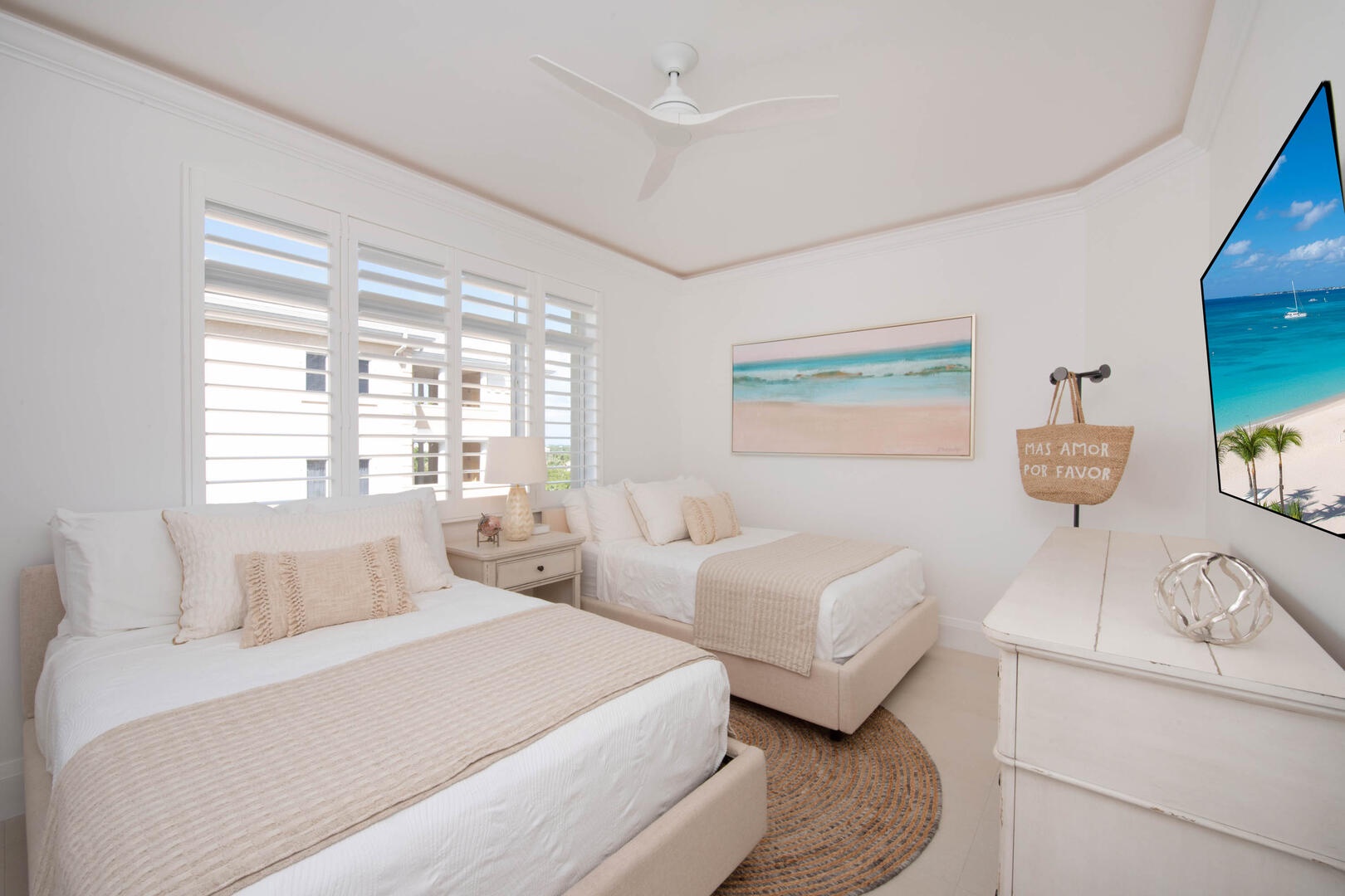 Guest Suite 2 with two double beds.