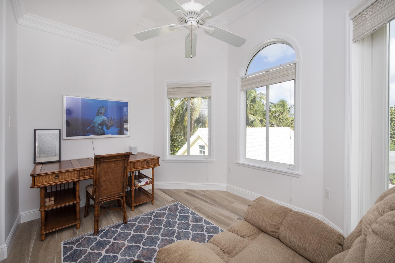 Home office on the upper level with desk, chair, and island views. Perfect for work-from-home-professionals!