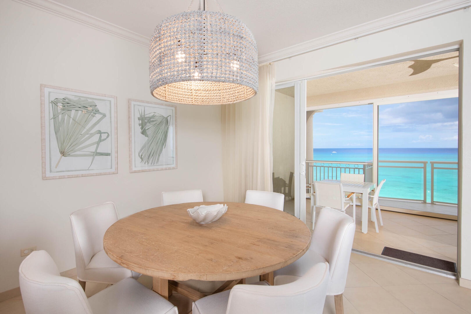 Dine indoors or out on the balcony with spectacular beachfront views.