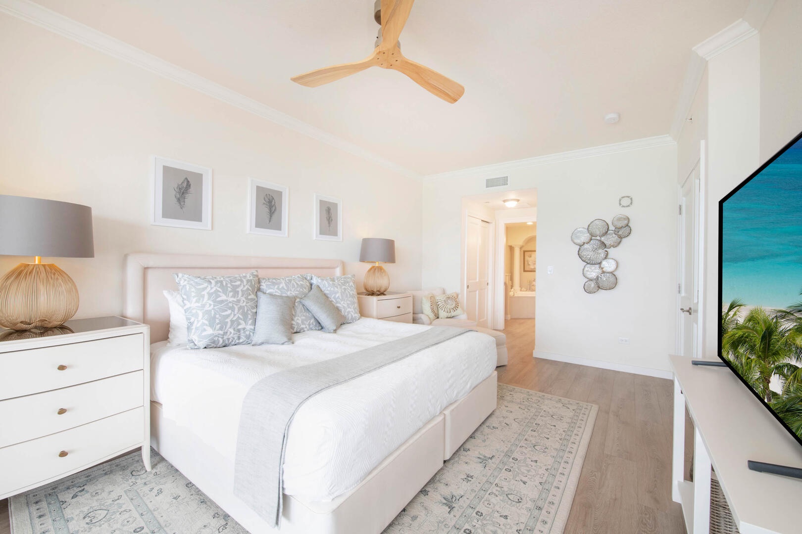 Primary Suite with Television and ocean views.