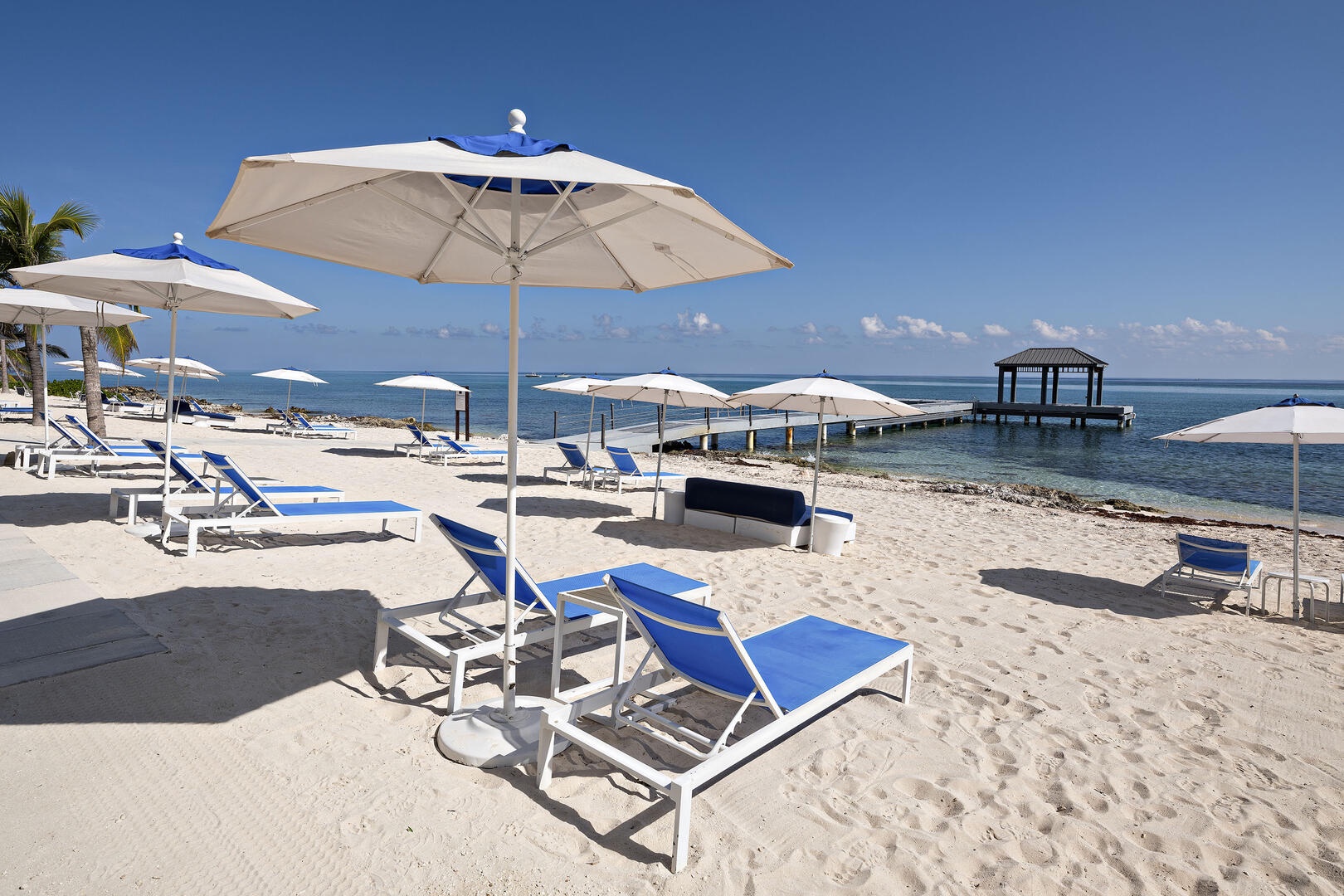 Beach service is set up daily exclusively for resort guests. Beach loungers, sun beds, and share umbrellas are on a first come first serve basis.