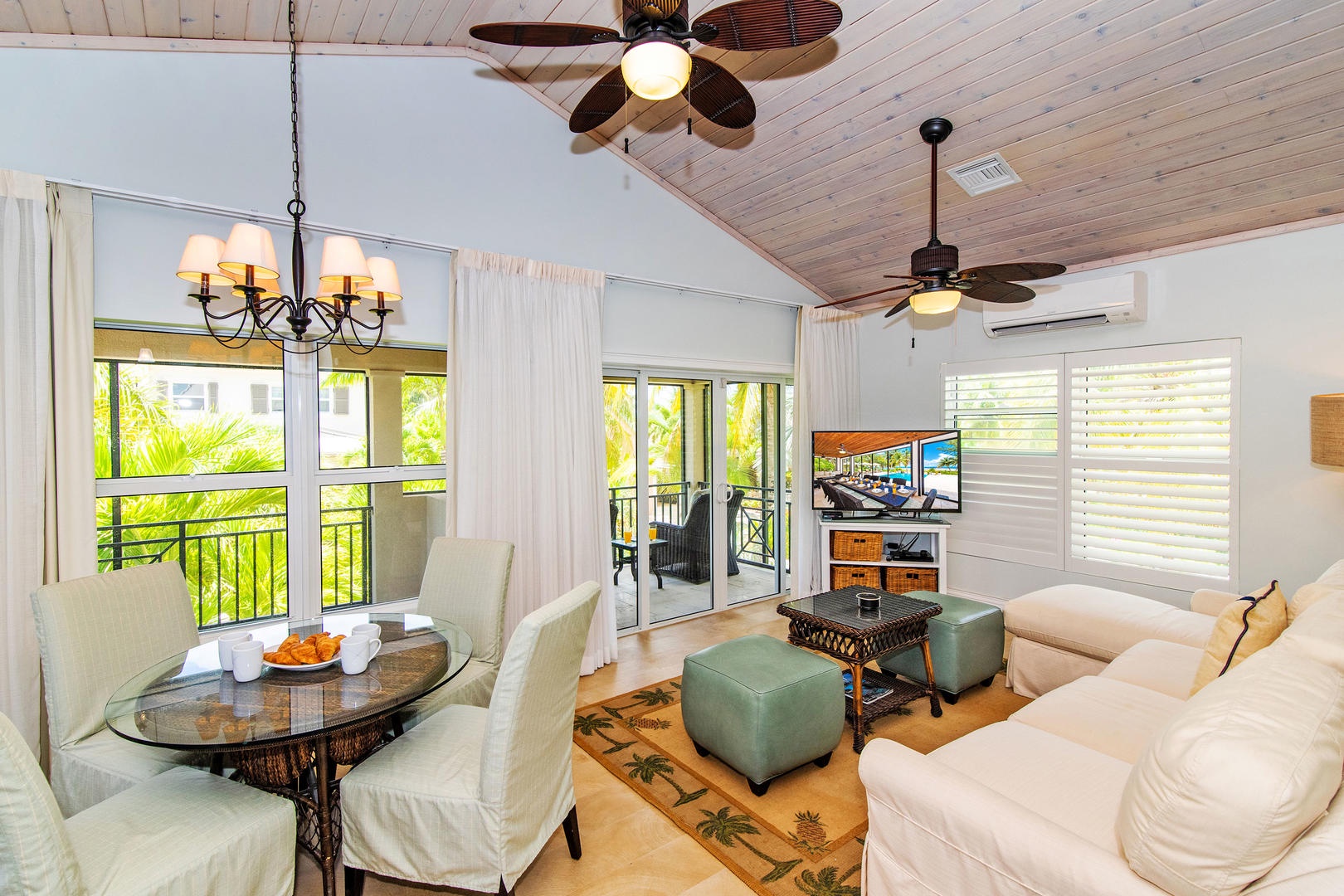 Cozy cottage suite with vaulted ceilings and screened balcony.
