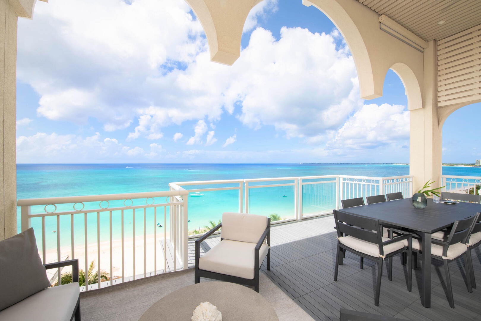 Your private balcony comes furnished with lounge seating and an alfresco dining table.