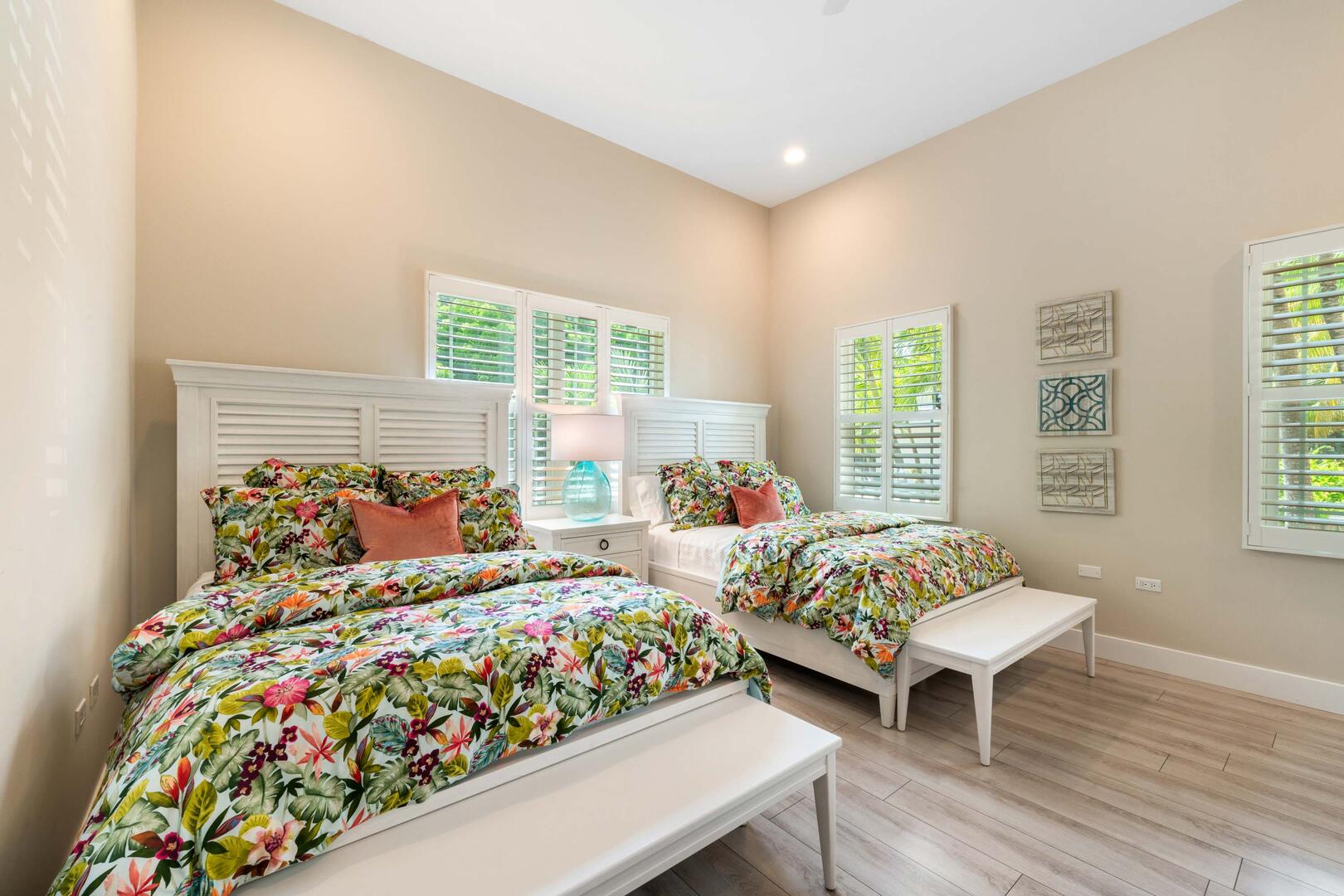 Bedroom #4 with two queen beds.