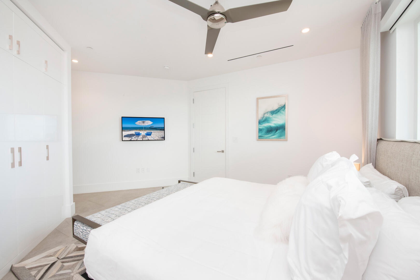 Guest Suite with SmartTV, walk-in closet.