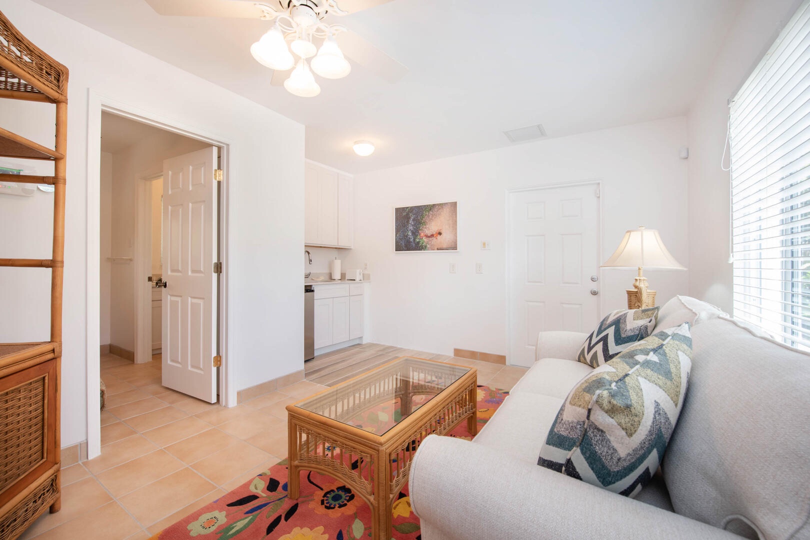 A sleeper sofa in the living area sleeps 2 children.