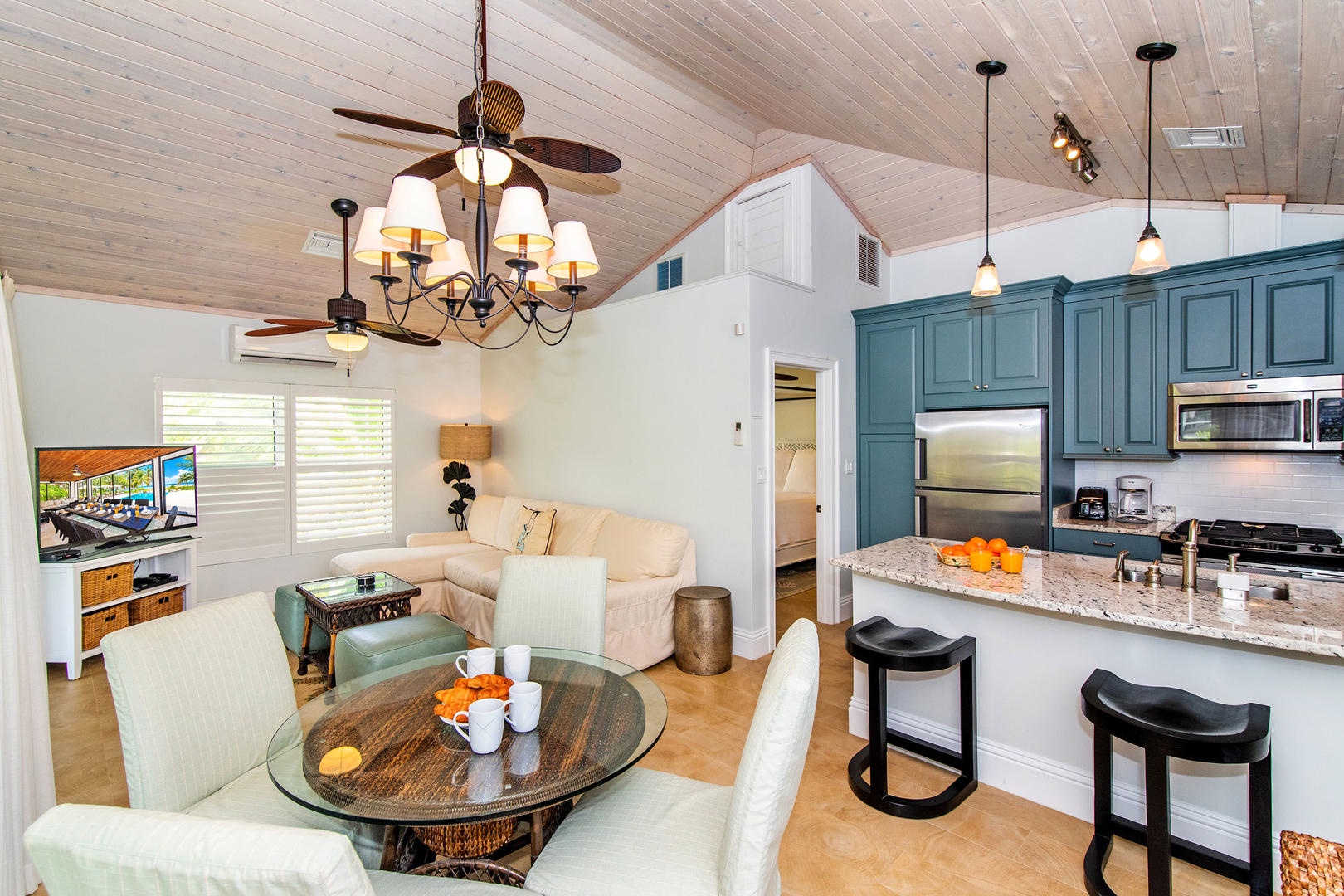 Small dining table and kitchen.
