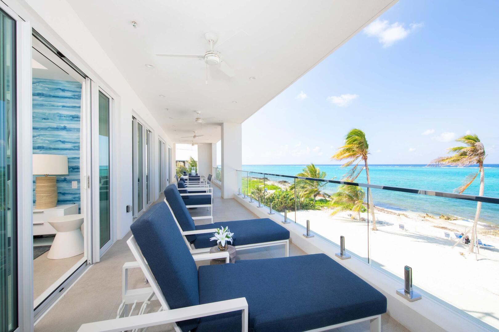Furnished balcony with beachfront views.