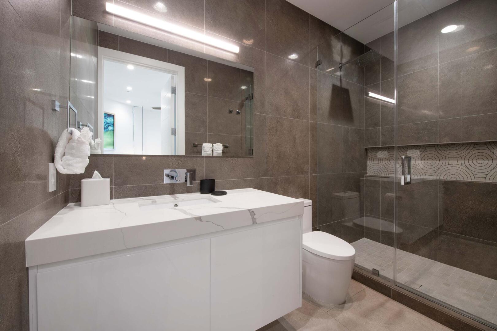 Guest Suite ensuite bath with walk-in shower.