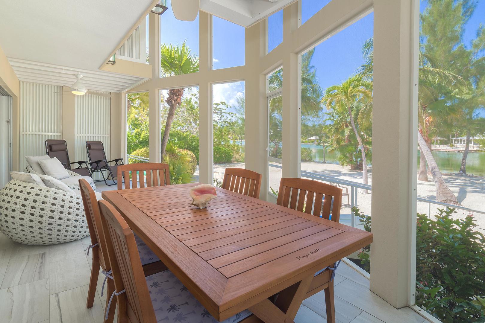 Enjoy a view with lunch at the dining table in the screened lanai.