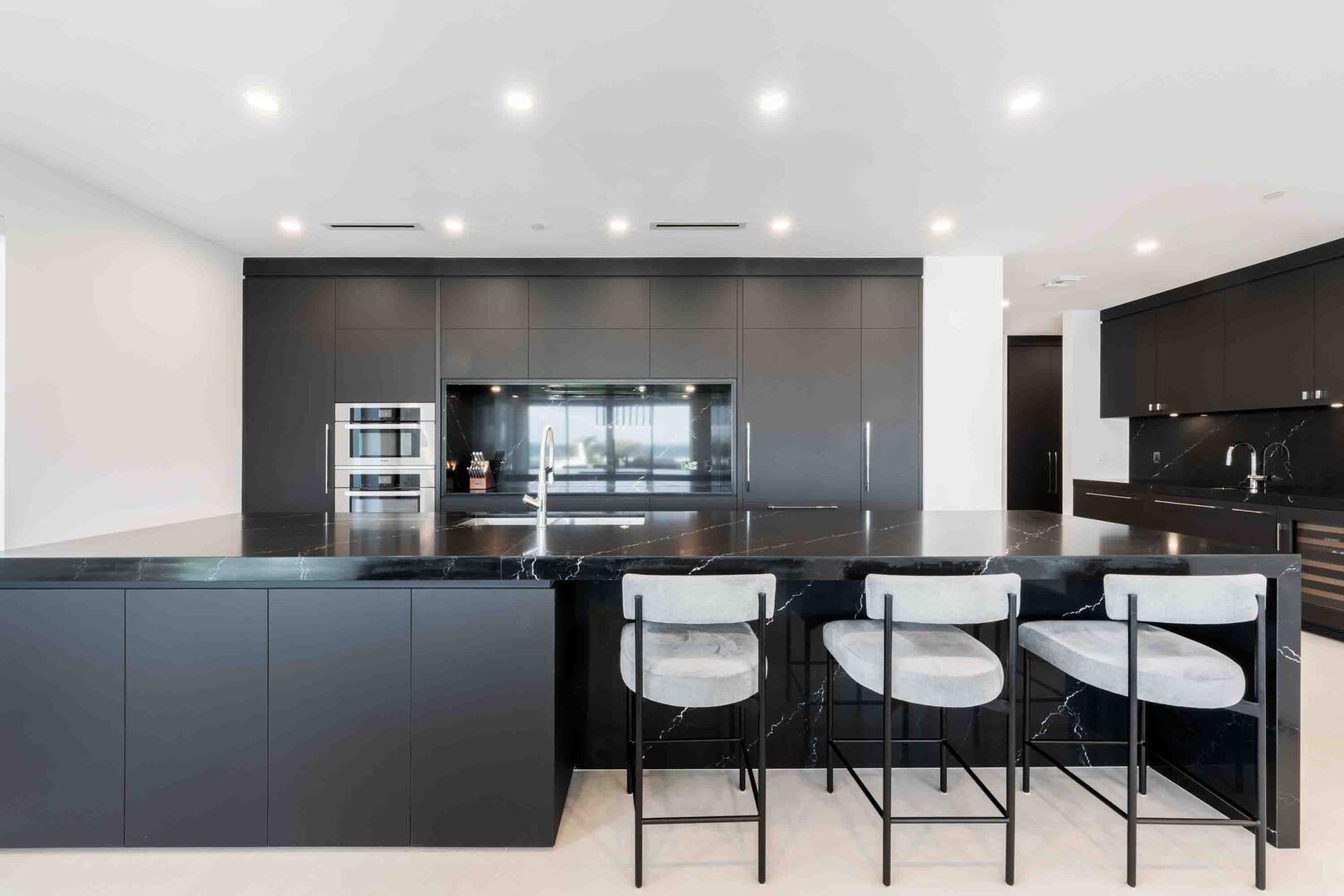 Kitchen island with breakfast bar seating for 3.