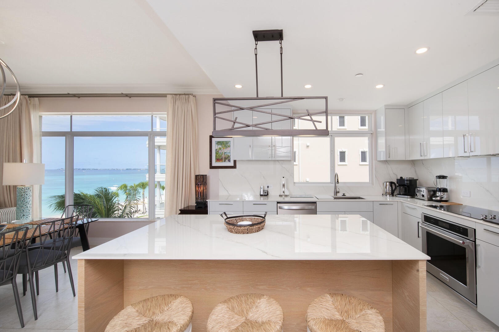Kitchen island includes seating for 4 guests.