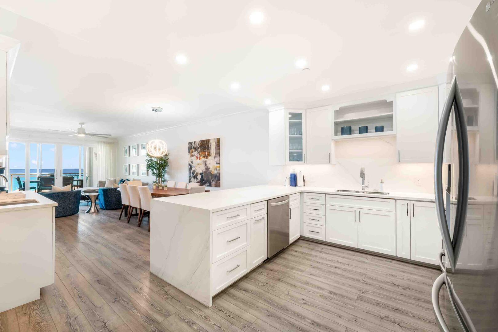 Full kitchen with modern appliances.