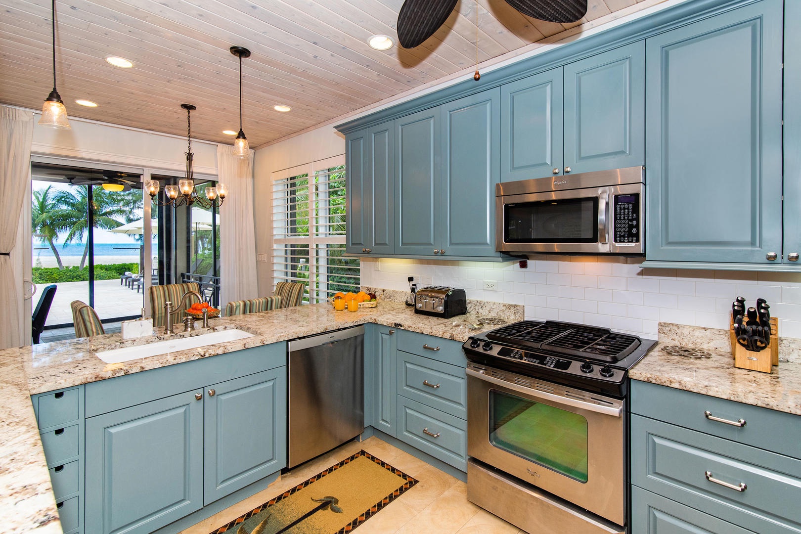 Full kitchen with modern appliances.