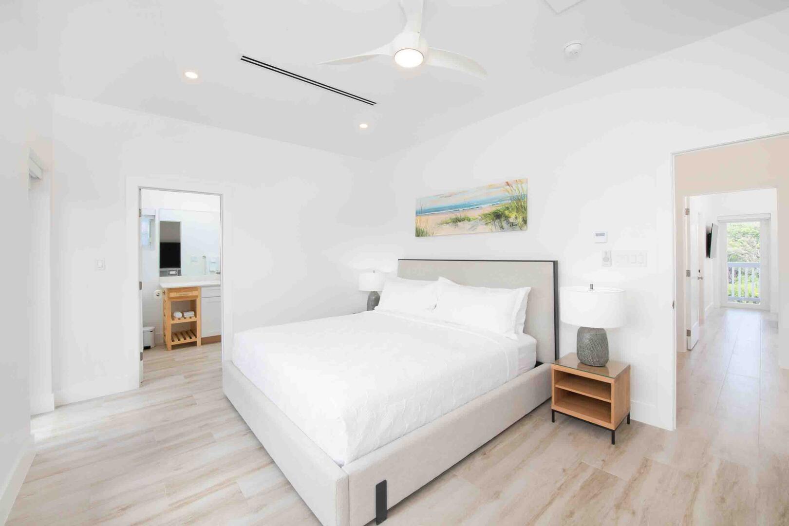 Bedroom 1 is the primary suite with king bed and ensuite bath.