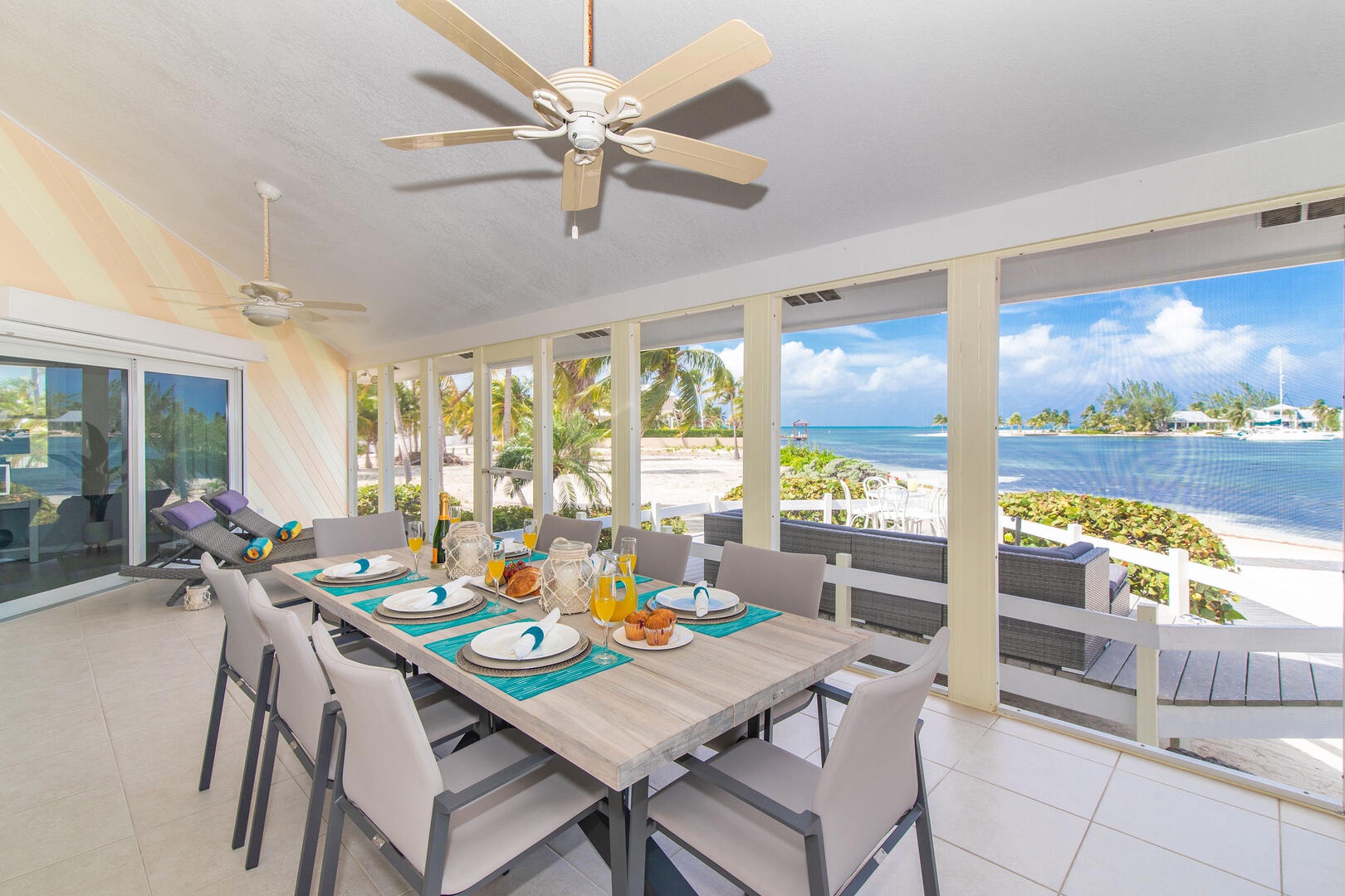 Roomy screened porch with walkout access to the sun deck.
