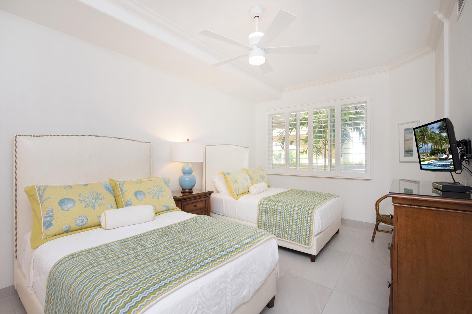 Bedroom 3 furnished with 2 double beds.