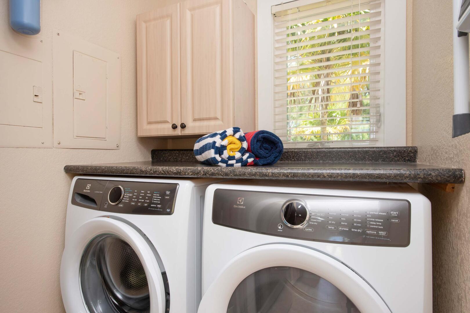 Washer and dryer adjacent from the kitchen.