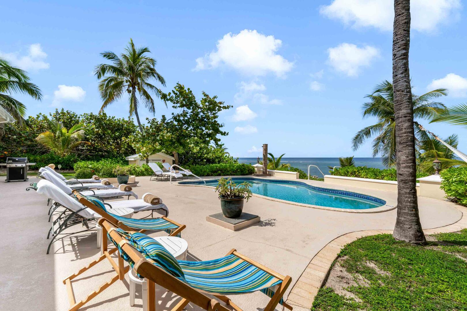 Lounge poolside with these amazing ocean views.