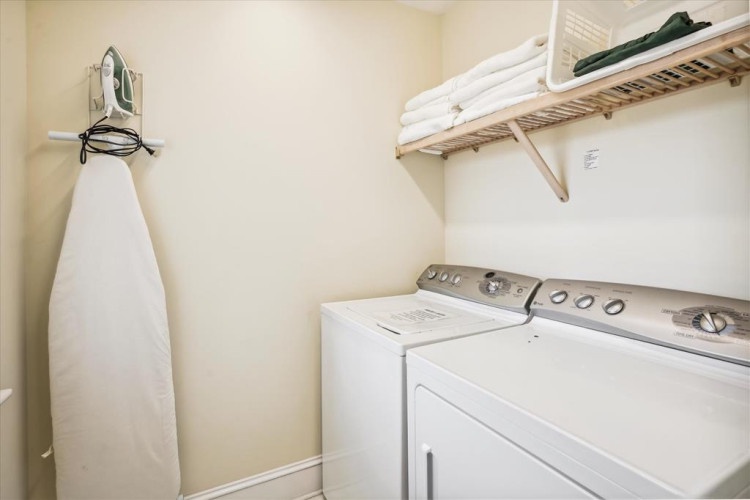 A dedicated in-unit laundry space with full-size washer and dryer keeps your vacation wardrobe fresh and ready for your next adventure.