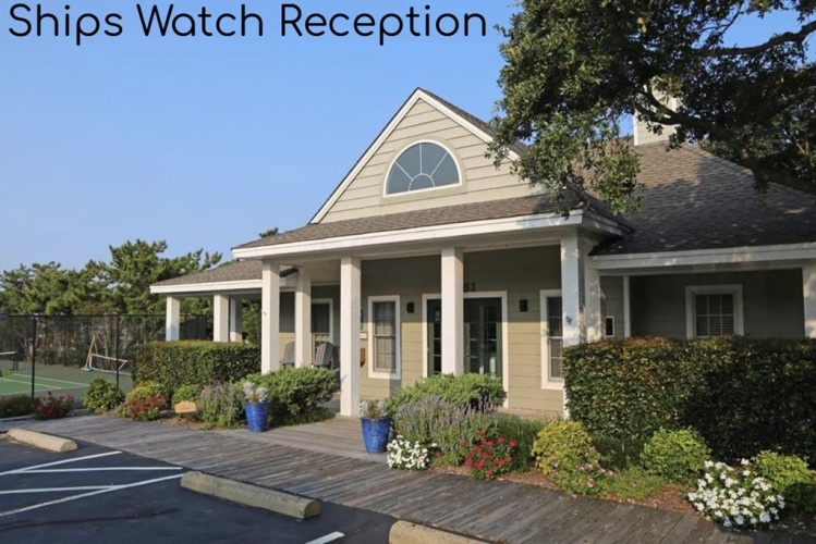 Ships Watch Reception stands as the welcoming entry point to the property, featuring classic coastal architecture and manicured landscaping that frames the arrival experience.