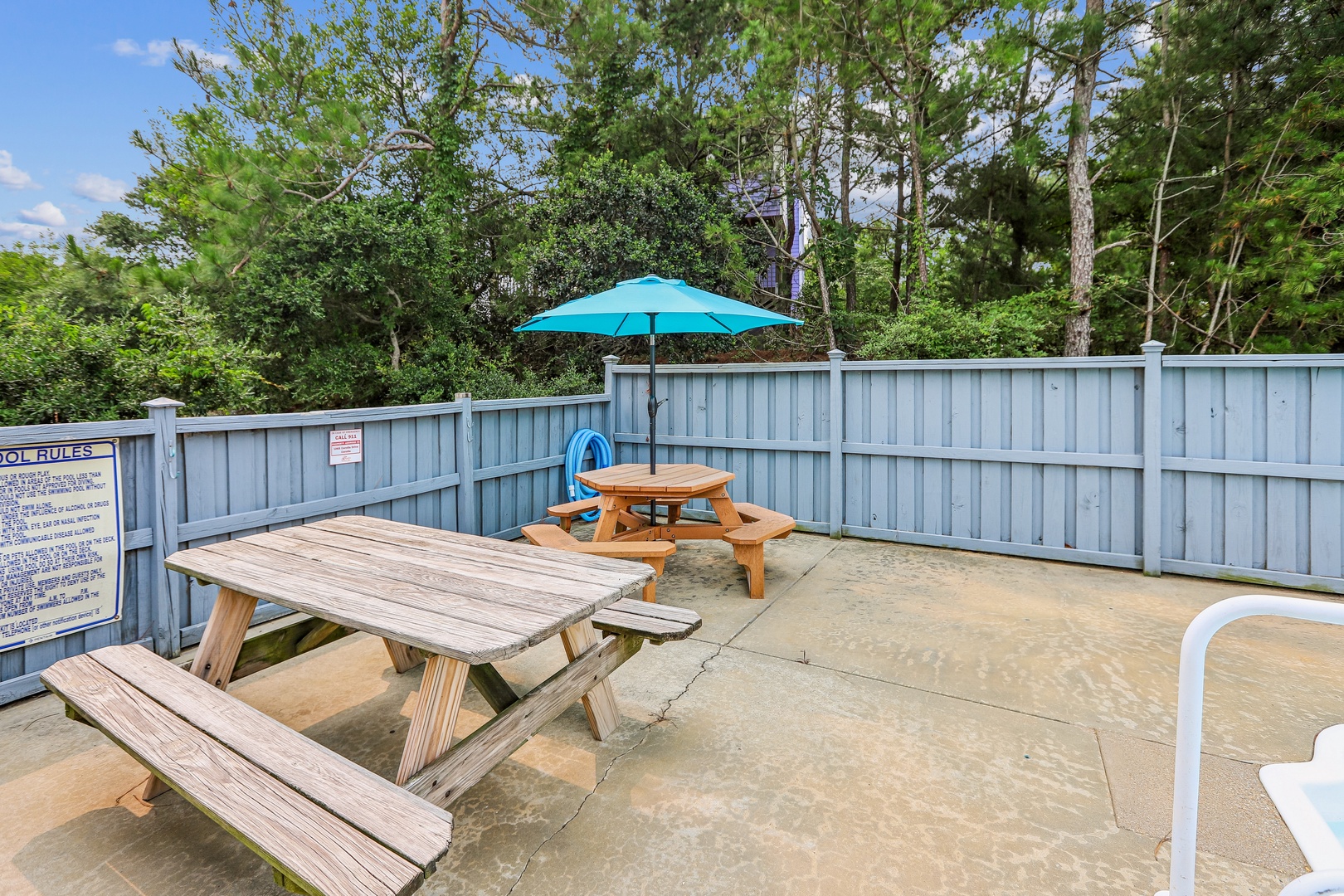 A private outdoor area surrounded by natural greenery, providing a peaceful spot for your morning coffee or afternoon relaxation.