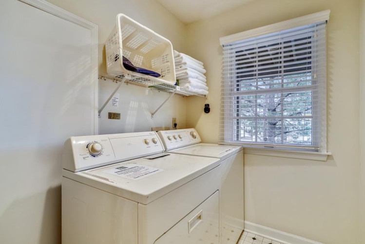 Your own in-unit washer and dryer make it easy to pack light and keep your clothes fresh throughout your stay, with neatly organized storage overhead.