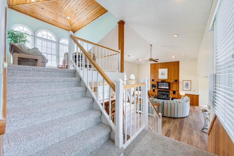 Step into a bright, spacious retreat where soaring ceilings and natural light create your perfect home away from home. The open layout invites relaxation and togetherness.