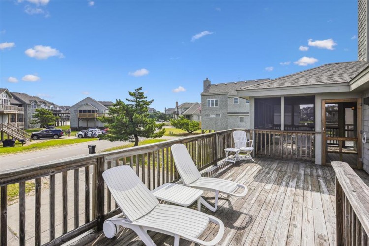 Stretch out on your private deck with comfortable loungers, perfect for soaking up the sun and enjoying the coastal breeze. The space is designed for relaxation, with a shaded area for cooler afternoons.